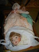 A quantity of vintage dolls.