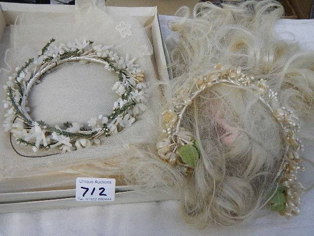 Two vintage wedding headresses and veils.