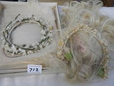 Two vintage wedding headresses and veils.