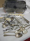 A mixed lot of cutlery and a tray.