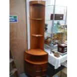 A Nathan teak corner unit.