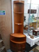 A Nathan teak corner unit.