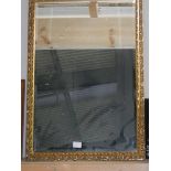 A gilt framed mirror.