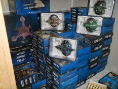 A large lot of boxed Star Trek Star ships (in excess of 50).