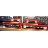 4 Hornby 00 gauge boxed carriages & 3 boxed rolling stock