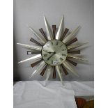 A circa 1960's star shaped wall clock.