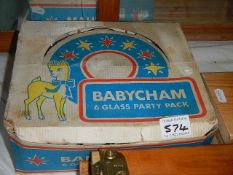 Six Babycham glasses in original box.
