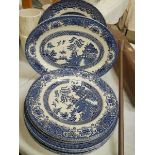 A mixed lot of blue and white plates.