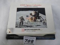 A 1999 space calendar, complete.