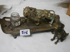 An antique inkstand mounted with a lion and a brass dog,.