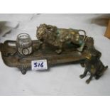 An antique inkstand mounted with a lion and a brass dog,.