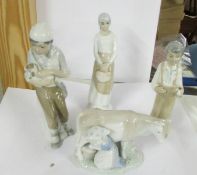 Four Lladro style figures.