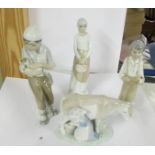 Four Lladro style figures.