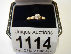 A 9ct gold diamond solitaire ring, size L half, 2 grams, good quality.