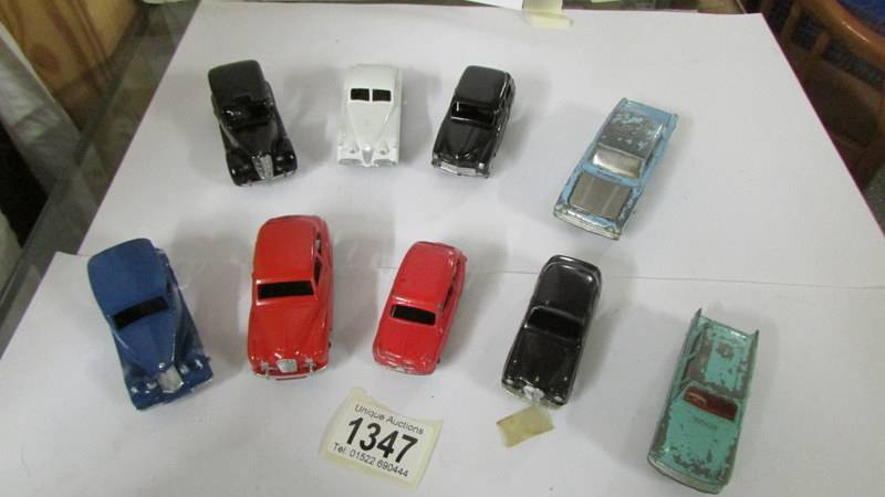 Nine 1950/60's Dinky toys, mostly repainted.