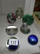 6 assorted glass paper weights