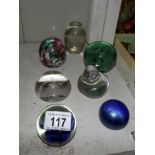 6 assorted glass paper weights