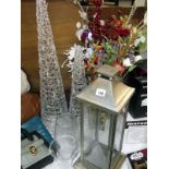 A pillar candle holder, vases, Christmas faux flowers and 2 decorative tree lights