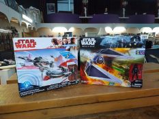 A Star Wars Rogue One Nerf and a Star Wars Force link resistance ski speeder, both sealed