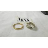 A 22ct gold wedding ring, size L, 2.1 grams and a 9ct gold eternity ring size L.