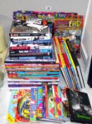 A large selection of children's books/annuals including The Simpsons, Beano etc