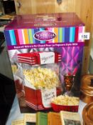 A popcorn maker, new and sealed in box