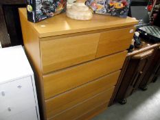 A pine effect bedroom chest of drawers 81cm x 49cm x 123cm