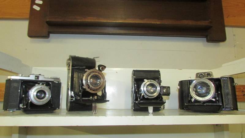 Twelve vintage folding camera's. - Image 2 of 4