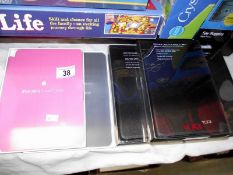 2 new and sealed I-Pad mini cases, 3 new Kindle Fire cases and a new and sealed Osmo genius kit
