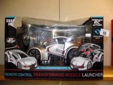 A sealed boxed radio control transforming missle launcher, box is a/f COLLECT ONLY
