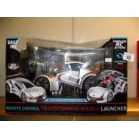 A sealed boxed radio control transforming missle launcher, box is a/f COLLECT ONLY