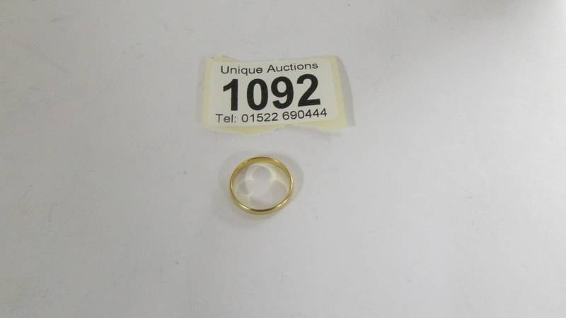 A 22ct gold wedding ring, size G half. 1.4 grams.