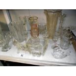 A selection of vintage moulded glass including vases