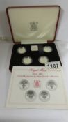 A cased Royal Mint 1984 - 1987 Uk £1 silver proof collection.