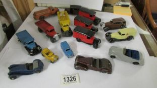A selection of post war Dinky toys including 25 series lorries, Austin Seven, Vauxhall etc.,