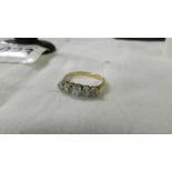 A five stone gold and platinum diamond ring, size K, 2.8 grams.