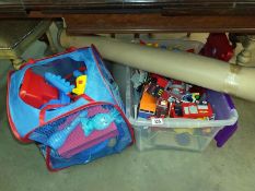 A large box of toy vehicles etc, plus a pop up bin of toys and a play mat/rug, COLLECT ONLY
