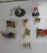 A quantity of vintage American flag brooches, a Canadian example and a pendant.