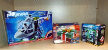 A boxed sealed Playmobil Ghostbusters 9224 and Lego 40292 and Playmobil 6921 (the latter one is