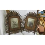 A pair of 19th-century carved wood photograph frames (1 a/f).