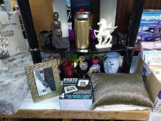 A quantity of candles, candle holders, perfume bottle, frame & a cushion etc.