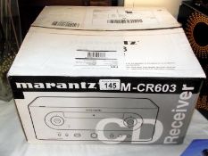 A Marantz cd receiver M-CR603, original inner packaging in the box.