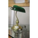A good quality brass bankers lamp with green glass shade. COLLECT ONLY.