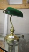 A good quality brass bankers lamp with green glass shade. COLLECT ONLY.