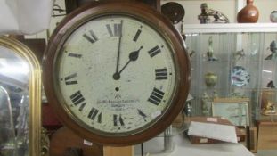 A circular wall clock marked Smith's English Clocks Ltd., London, 1944.