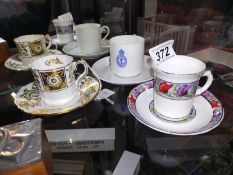 A Royal Crown Derby tea cup and saucer plus 2 others