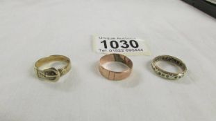 Two 9ct gold rings, sizes P & Q, 4.9 grams and an eternity ring, size Q.