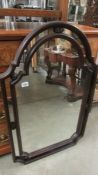 A mahogany arched top mirror. COLLECT ONLY.