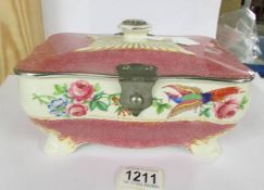 An English ceramic bird decorated box with plated fittings, 21 x 14 x 10 cm.