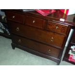 A dark wood stained 5 drawer chest, Height 71cm, width 82cm, depth 47cm COLLECT ONLY